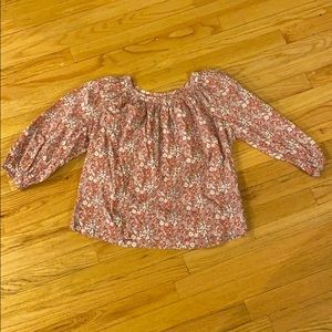 Red and white floral blouse